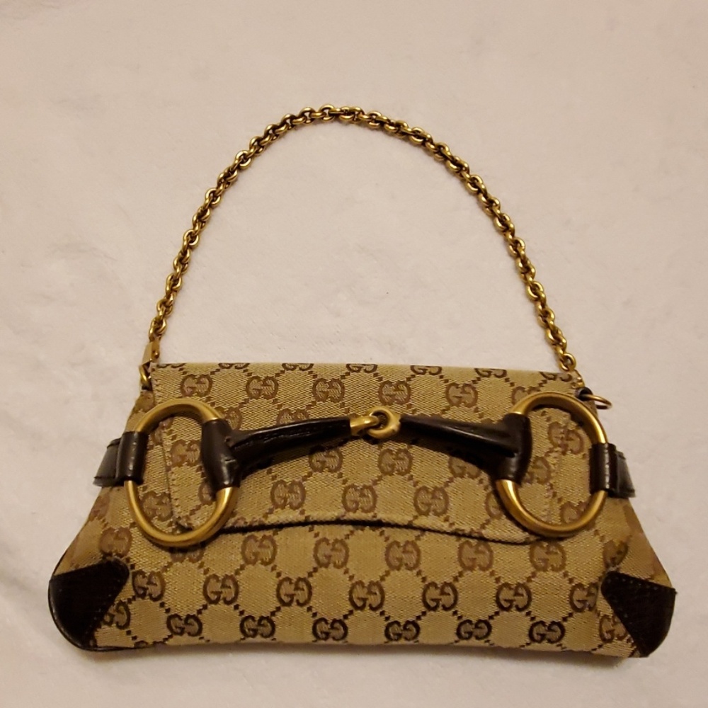 New Gucci  Clutch with chain